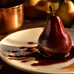 Poires au vin rouge recette bourguignonne : poire pochée nappée de sirop