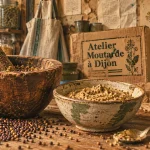 Atelier moutarde dijon : graines de moutarde broyées, mortier en bois